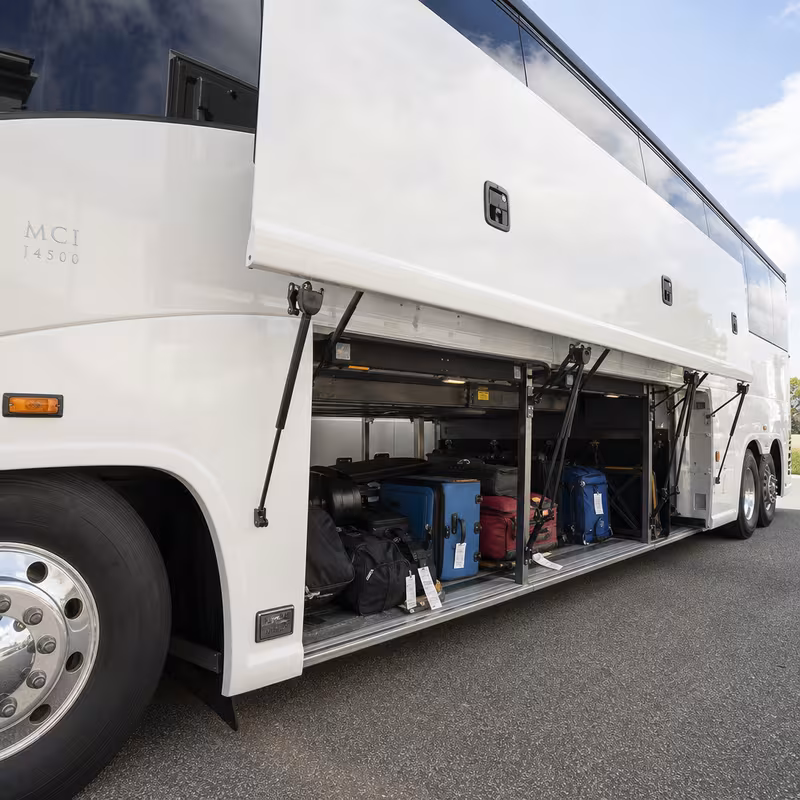 Party bus interior with wraparound leather seating and LED lighting in New Orleans