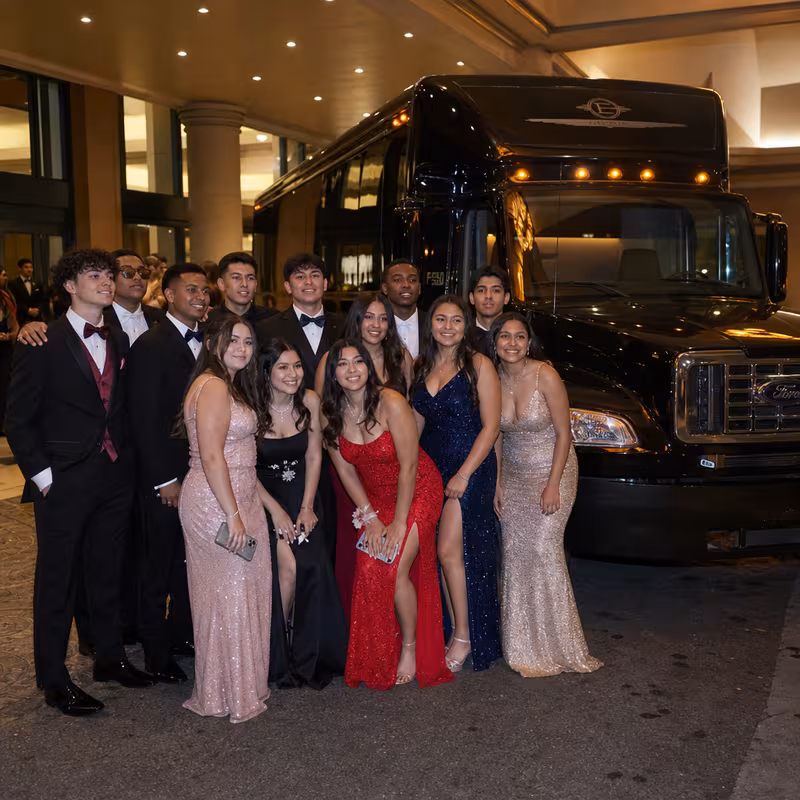 Party bus interior with wraparound leather seating and LED lighting in New Orleans