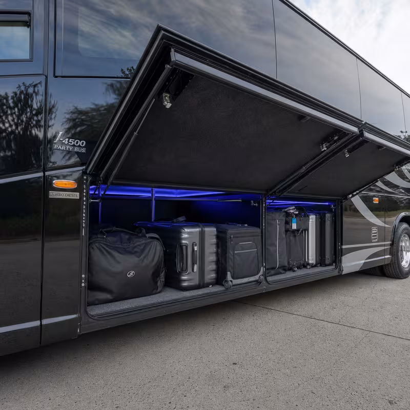 Party bus interior with wraparound leather seating and LED lighting in New Orleans