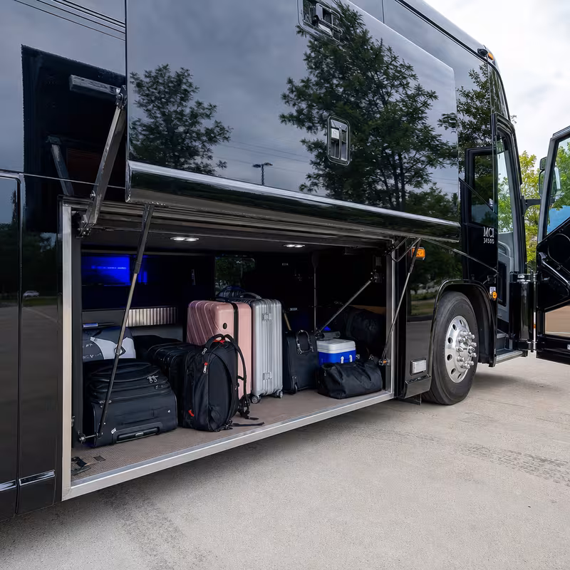 Party bus interior with wraparound leather seating and LED lighting in New Orleans